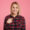 imgi_19_smiling-pleasant-looking-indicates-herself-with-finger-dressed-casual-checkered-shirt-being-good-mood_176532-9631